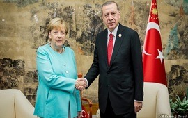 Меркель: Есть признаки ослабления напряженности